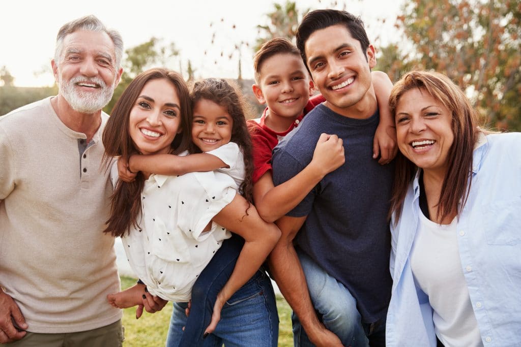 A photo of a family that would like their us tax refunds for American families abroad in 2023. This includes refunds like the Child Tax Credit