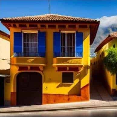 A vibrant yellow house with blue blinds. Retirement property in Mexico with your dual citizenship. 
