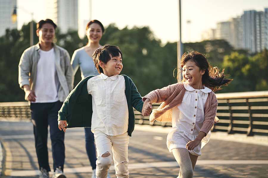 American Family claiming child tax credits on their US taxes Walks together in Korea 