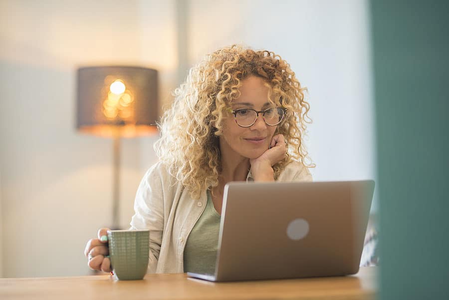 Woman drinking tea wonders what is a tax treaty?